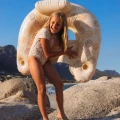 Neutral_Swimsuit_Shortsleve_SEASHELLS_Hammock_Lounge_3.webp